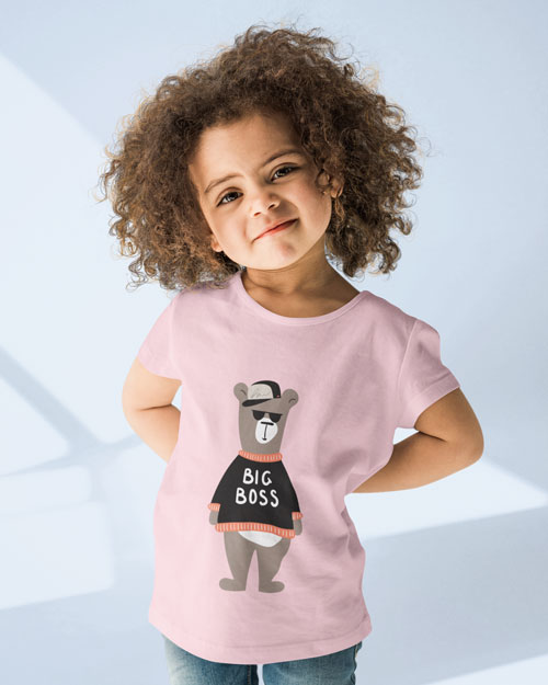 girl with curly hair wearing pink cheeky chappy kids tshirt with bear print