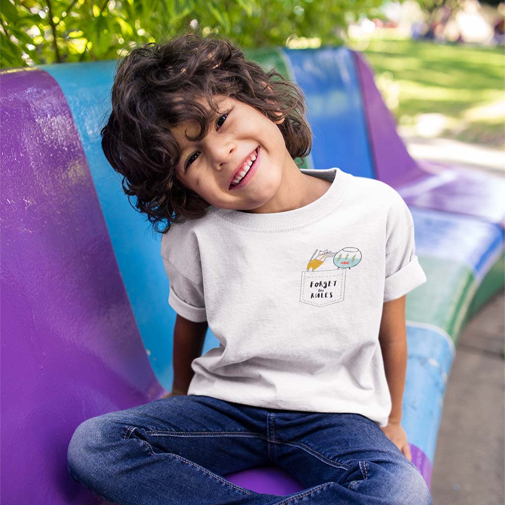 boy-sitting-on-a-bench-wearing-a-tshirt-template-while-smiling-a17864 boy sitting on a bench wearing a tshirt template while smiling a17864