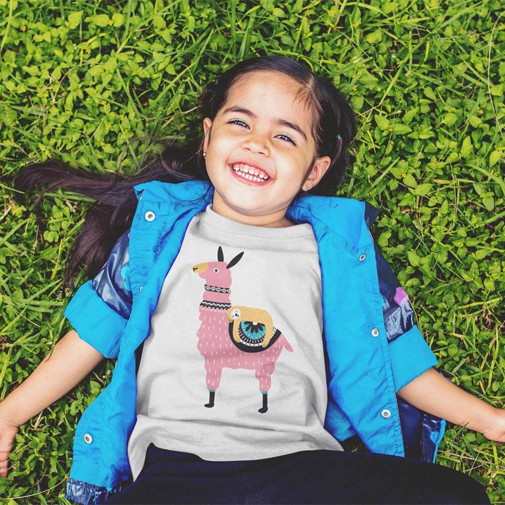 t-shirt-mockup-of-a-little-girl-lying-in-the-grass-smiling-a120992 t shirt mockup of a little girl lying in the grass smiling a120992