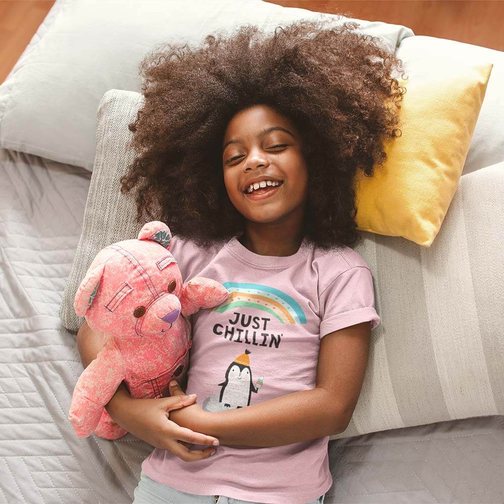 t-shirt-mockup-of-a-smiling-black-girl-with-curly-hair-on-bed-a213191 t shirt mockup of a smiling black girl with curly hair on bed a213191